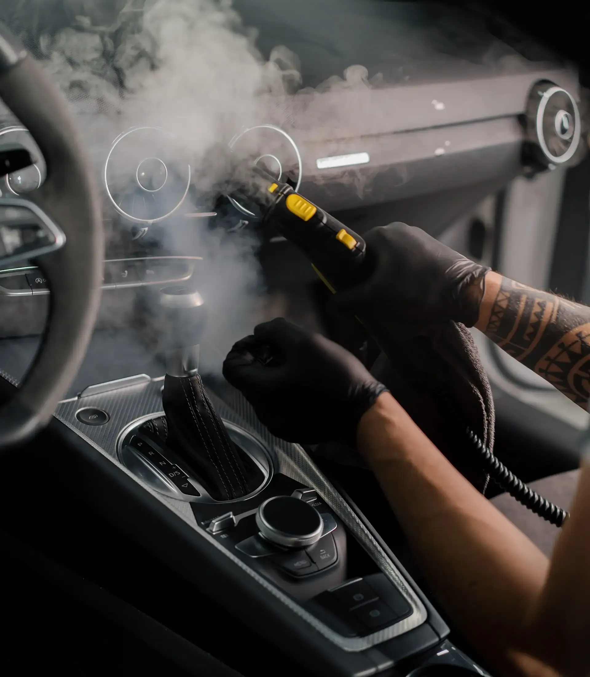 Steam cleaning the interior of a car